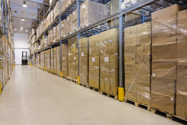 Warehouse Of Cardboard Boxes That Are Pallet Wrapped