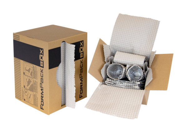 A Paper Bubble Wrap Dispenser Box with a pair of glasses in it.